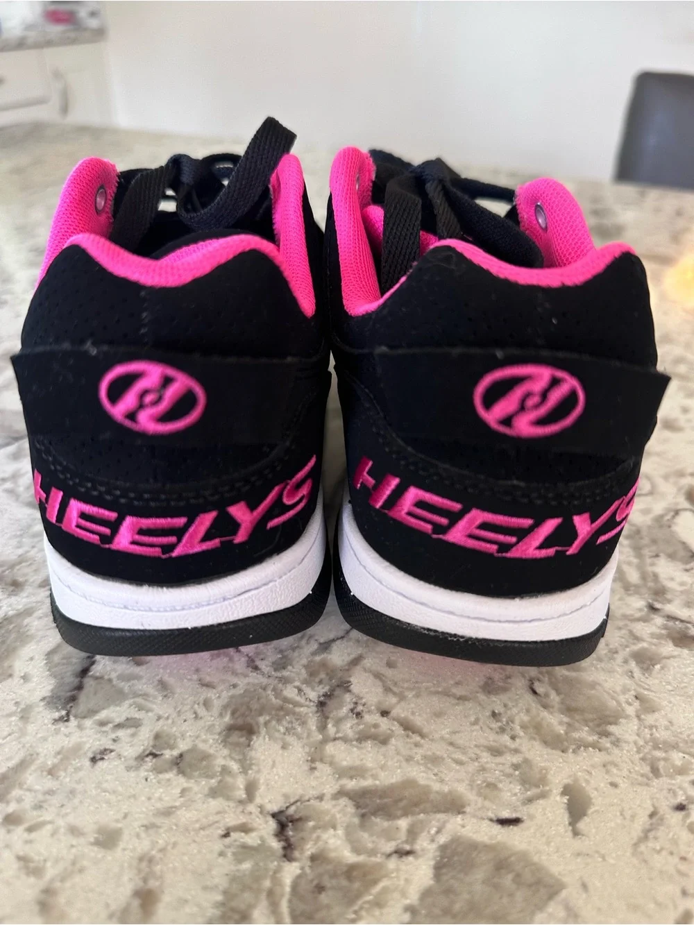 Heelys Black and Hot Pink Kid’s Lace-Up Sneakers